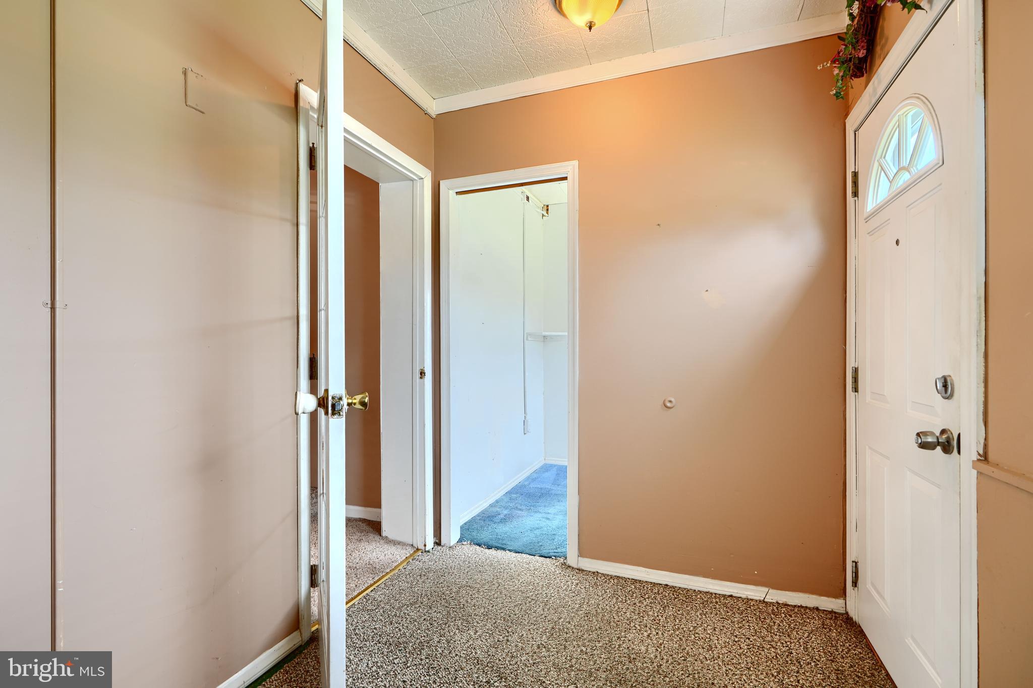 235 Trappe Road Baltimore, MD 21222 - Photo 7 of 37 a view of a hallway with closet and wooden floor