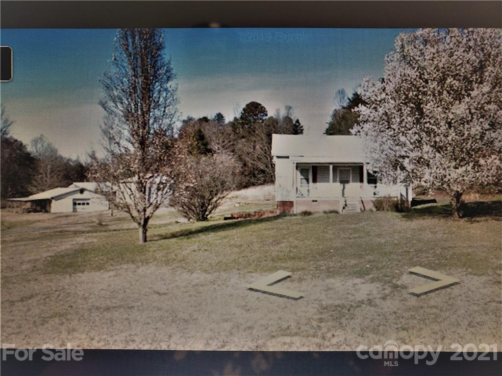 6450 Wright Road Kannapolis, NC 28081 - Photo 1 of 1 a view of a house with a yard