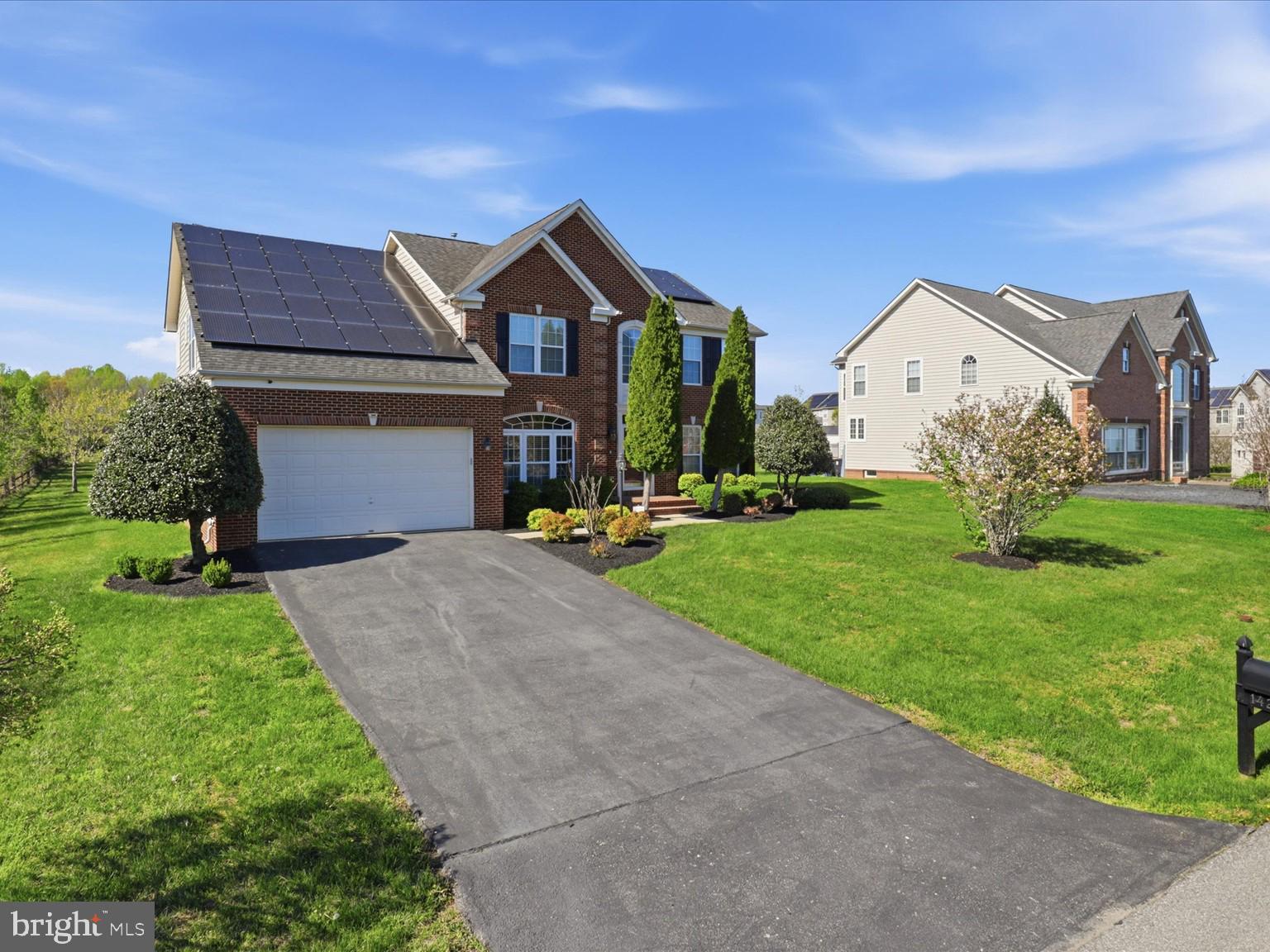 14202 Derby Ridge Road Bowie, MD 20721 - Photo 4 of 57 2 CAR GARAGE WITH ASPHALT DRIVEWAY