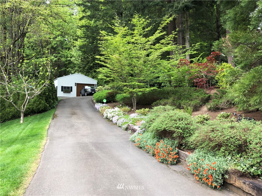 17426 Southeast May Valley Road Renton, WA 98059 - Photo 7 of 19 a view of a back yard with green space