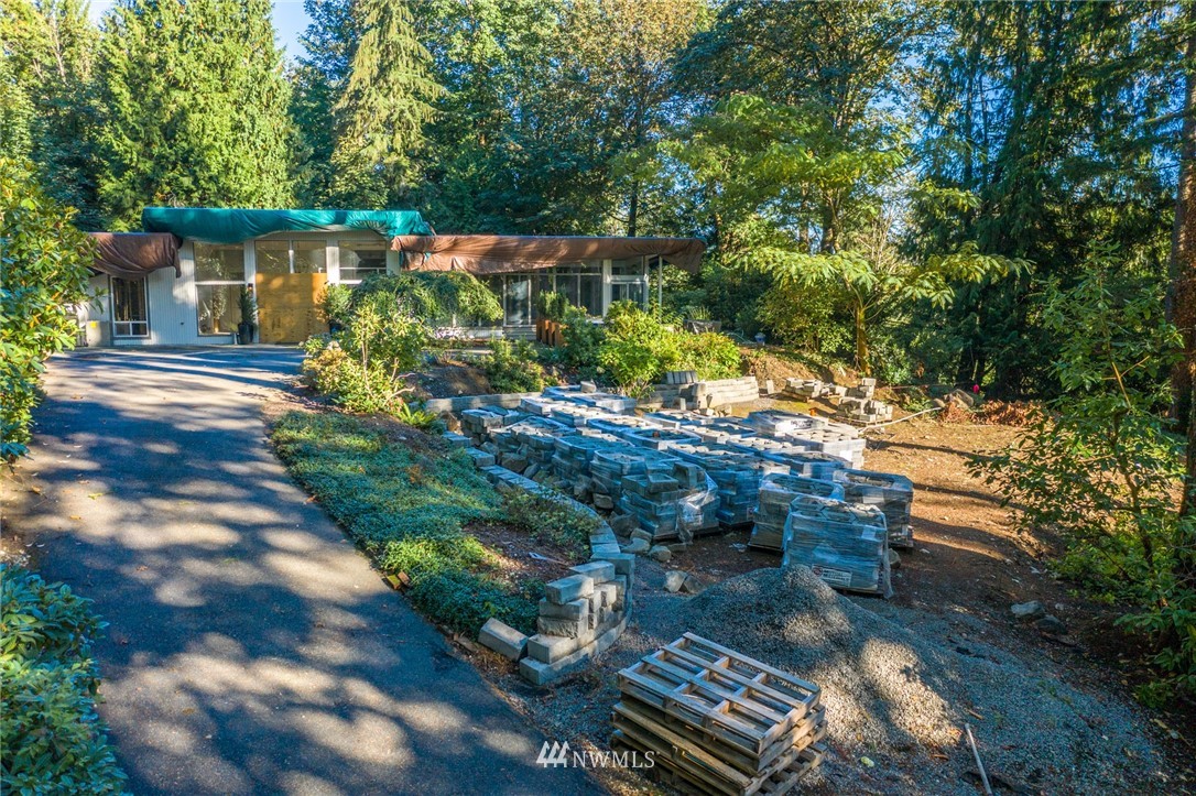17426 Southeast May Valley Road Renton, WA 98059 - Photo 10 of 19 a backyard of a house with lots of green space