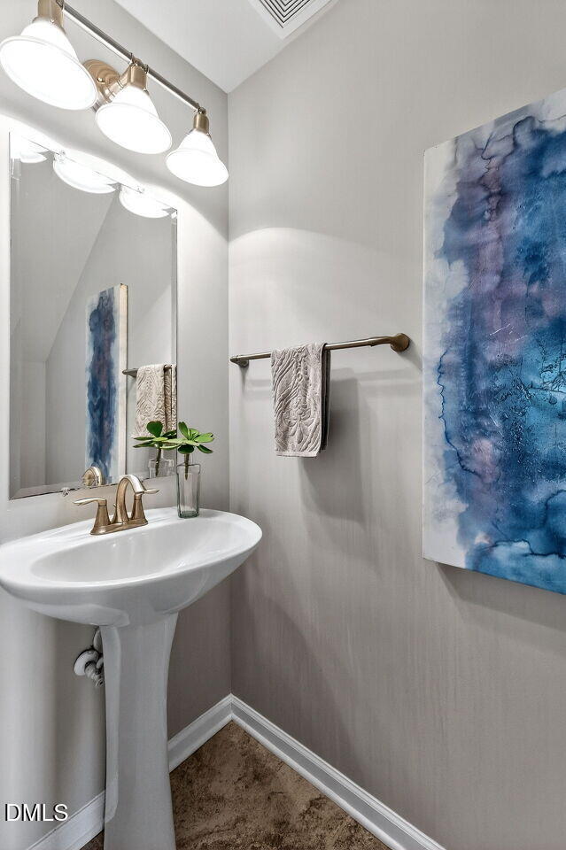 8215 Yaxley Hall Drive Raleigh, NC 27616 - Photo 18 of 42 019-1280x960-powder-room
