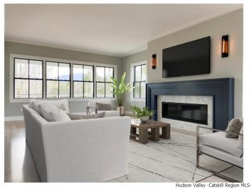 194 Lower Sahler Mill Road Olivebridge, NY 12461 - Photo 11 of 16 a living room with furniture a flat screen tv and a fireplace