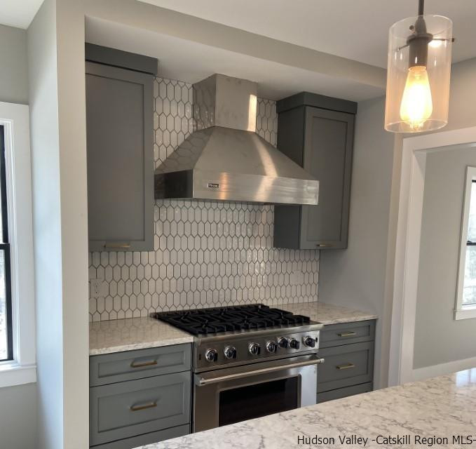 194 Lower Sahler Mill Road Olivebridge, NY 12461 - Photo 7 of 16 a kitchen with a stove and a cabinet
