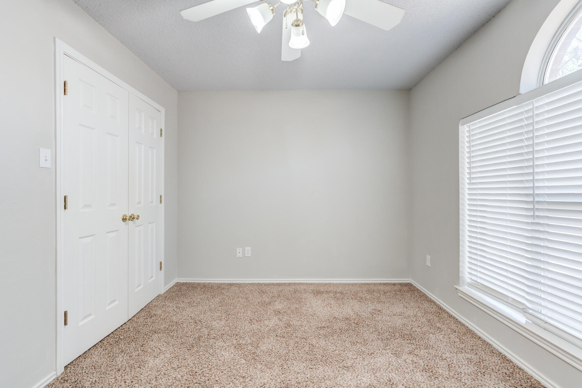 3425 97th Street Lubbock, TX 79423 - Photo 16 of 22 an empty room with a window