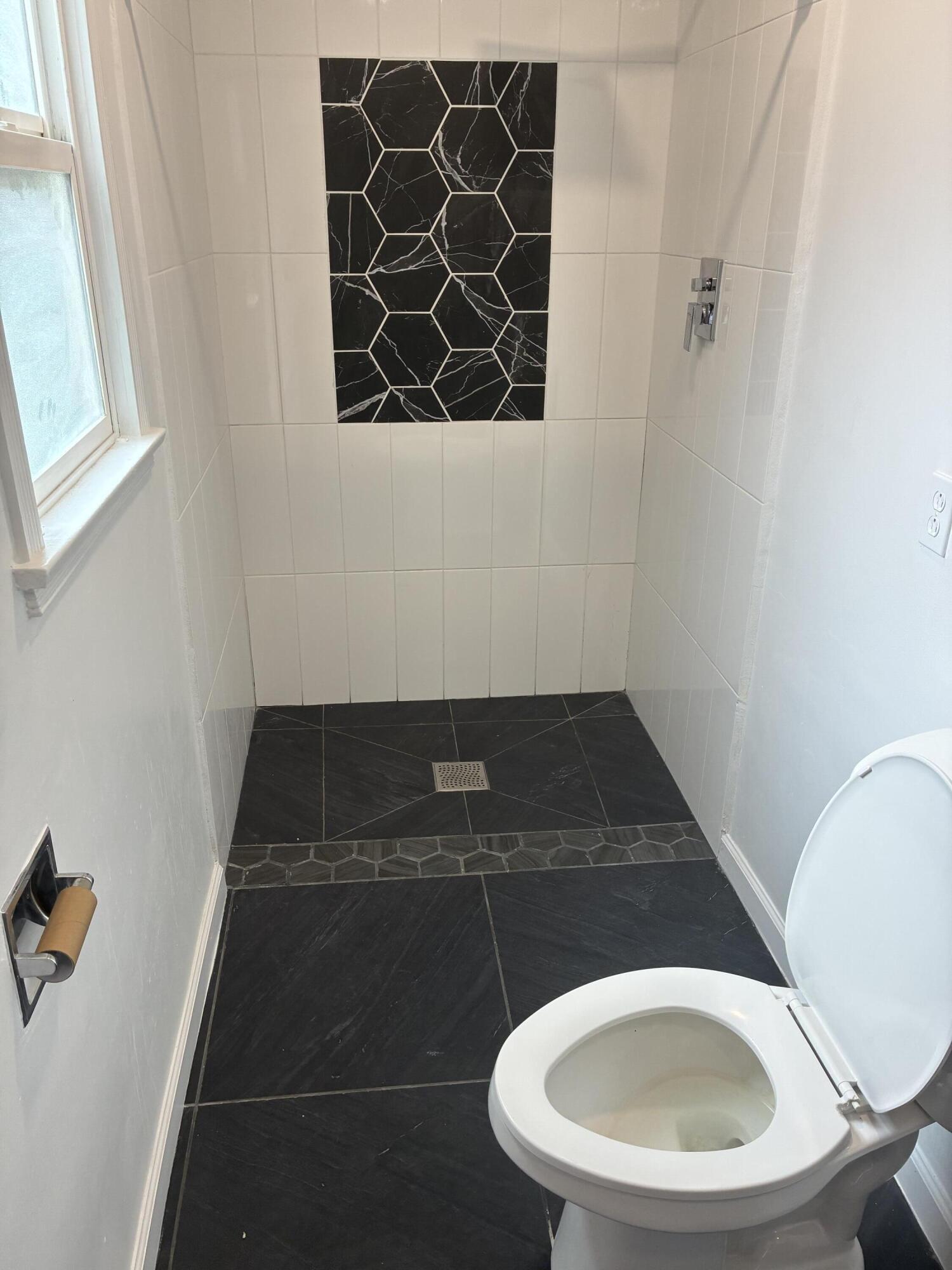 315 East Stevens Road, Unit 4 Palm Springs, CA 92262 - Photo 6 of 12 a bathroom with a sink and a mirror