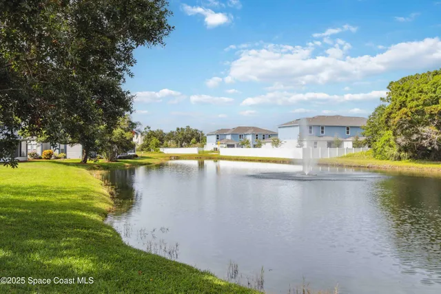 a view of a lake with a big yard