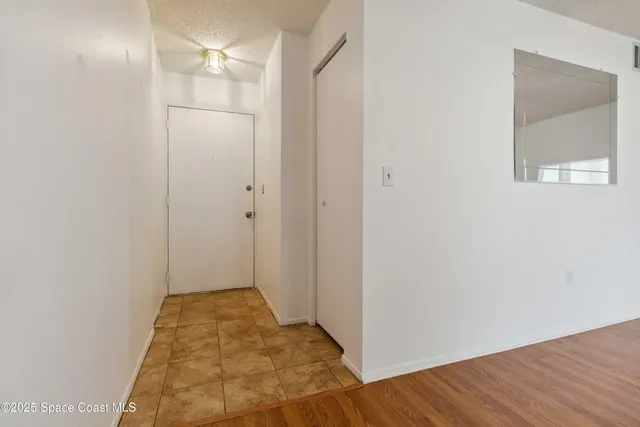 a view of bathroom with wooden floor