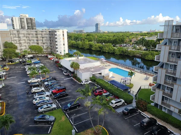 a view of a park with large trees