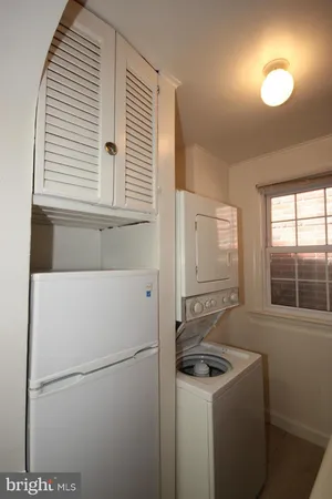 a bathroom with a sink and a window