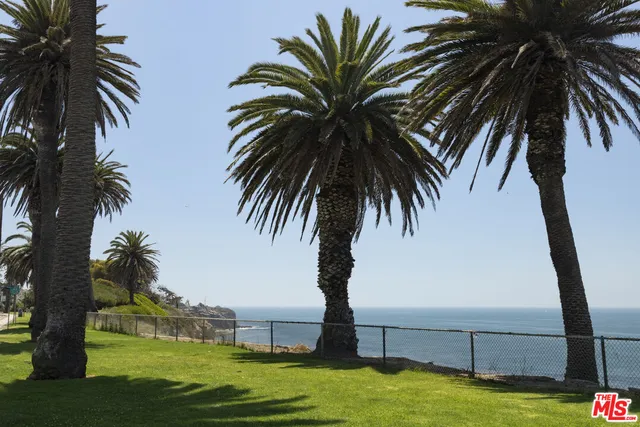 a view of a lake in middle of the town