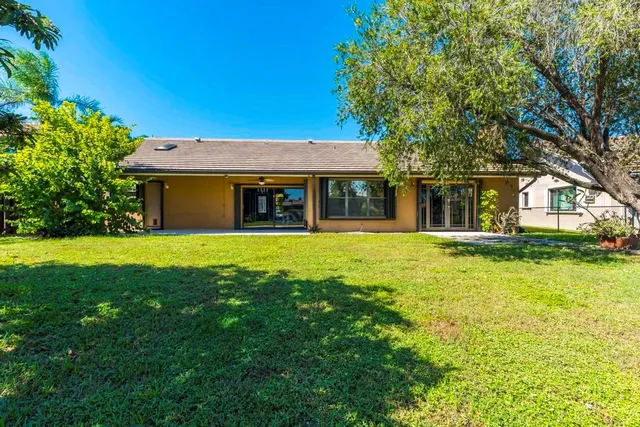 a front view of house with yard