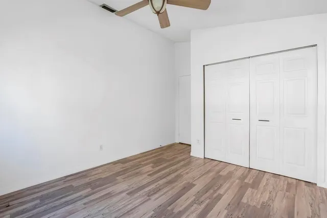 a view of small space with wooden floor