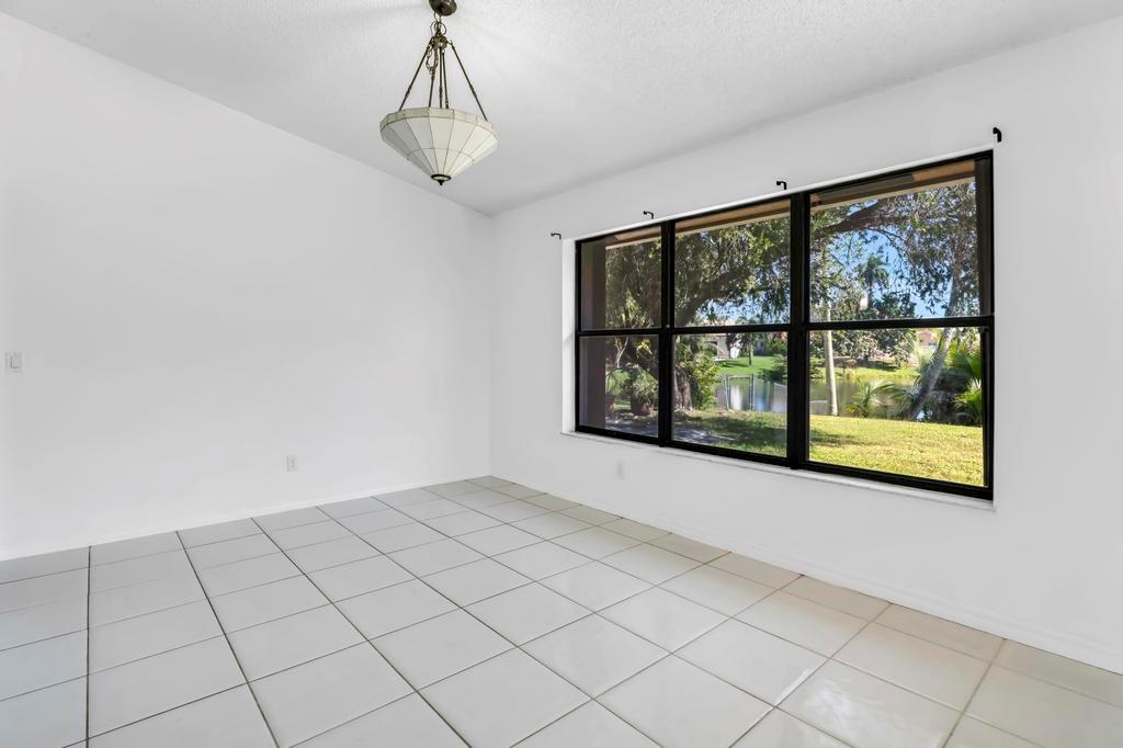 5720 West Waterford Drive Davie, FL 33331 - Photo 19 of 25 a view of an empty room with a window