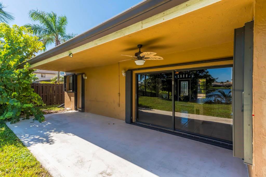 5720 West Waterford Drive Davie, FL 33331 - Photo 25 of 25 a view of backyard with porch