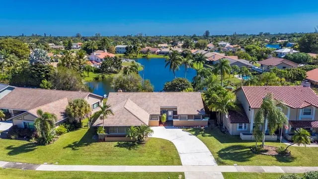 an aerial view of a house with a garden