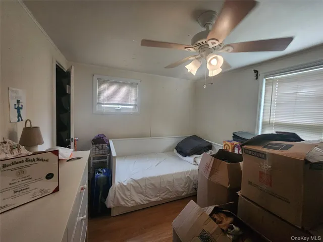 a bedroom with a bed and furniture