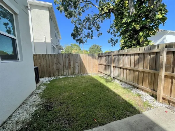 a view of a backyard with a garden