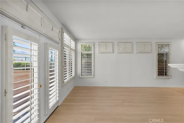 a view of a kitchen with a sink and cabinets