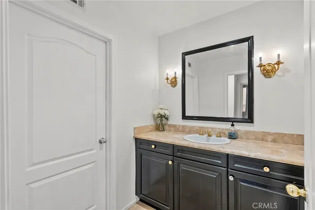 a view of an empty room with glass door