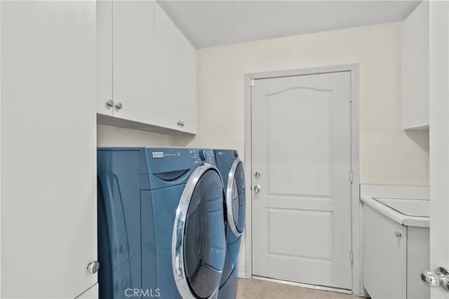 a view of a hallway with staircase