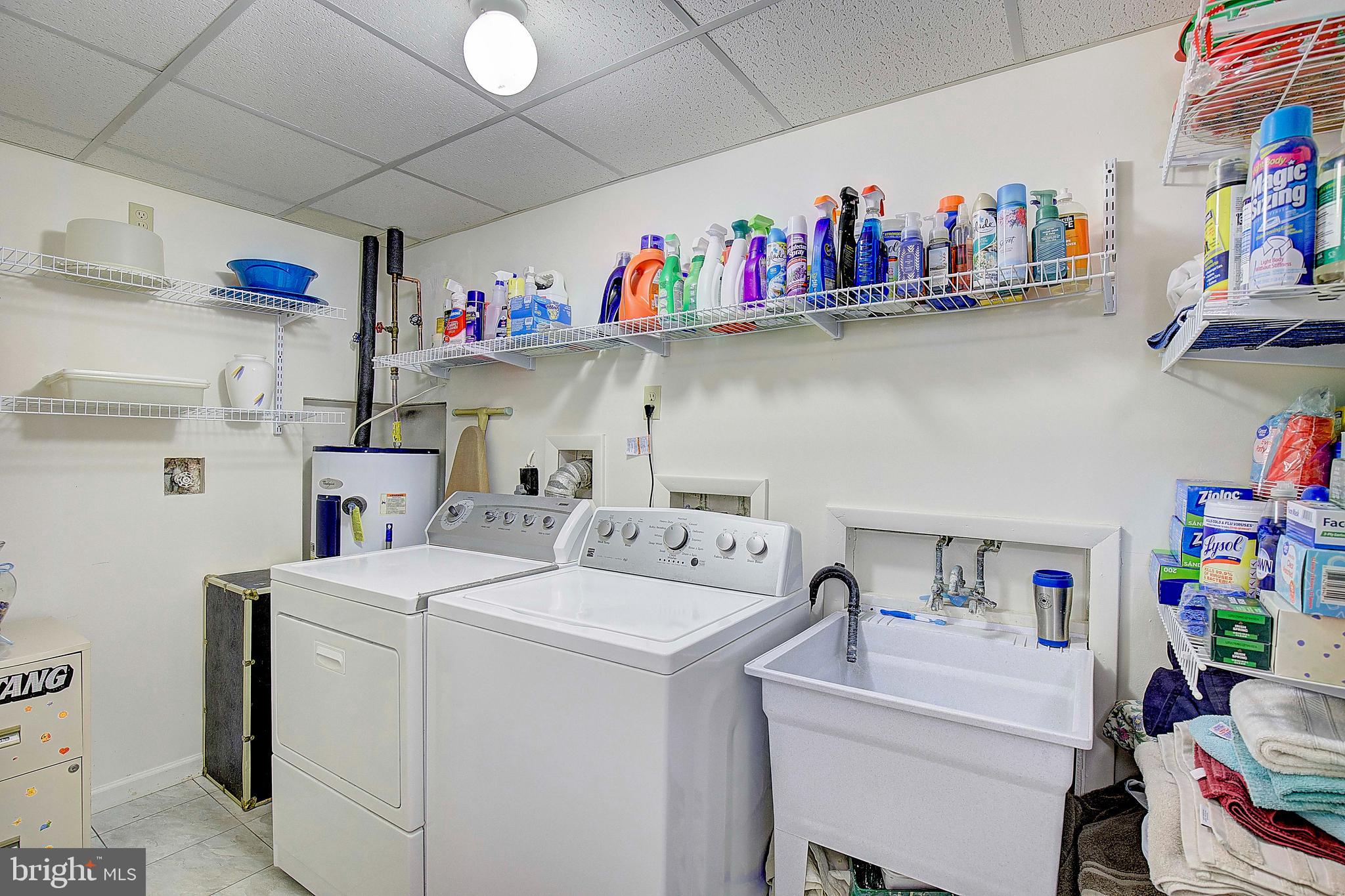 5018 Long Beach Road St. Leonard, MD 20685 - Photo 29 of 39 a utility room with dryer and washer