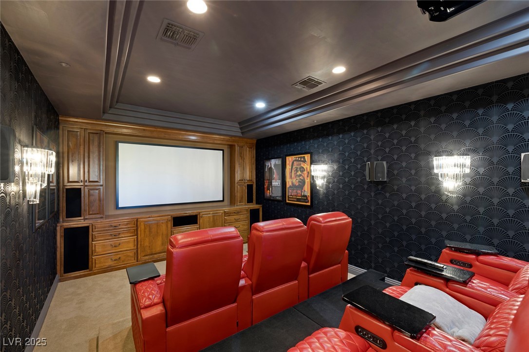 1545 Villa Rica Drive Henderson, NV 89052 - Photo 31 of 61 Home theater room with wallpapered walls, a raised ceiling, recessed lighting, and light colored carpet