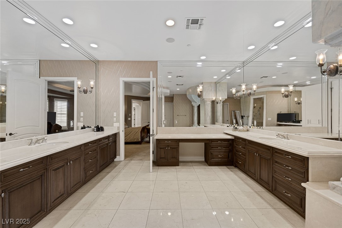 1545 Villa Rica Drive Henderson, NV 89052 - Photo 33 of 61 Ensuite bathroom with a chandelier, two vanities, recessed lighting, and tile patterned floors