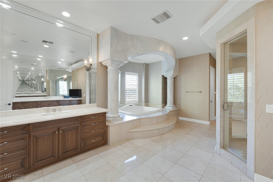 1545 Villa Rica Drive Henderson, NV 89052 - Photo 34 of 61 Full bathroom with vanity, a bath, a stall shower, recessed lighting, and tile patterned floors