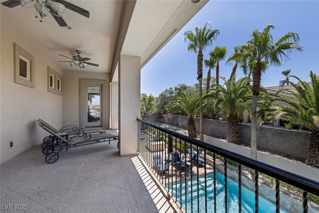 1545 Villa Rica Drive Henderson, NV 89052 - Photo 35 of 61 Balcony featuring view of pool area and a ceiling fan