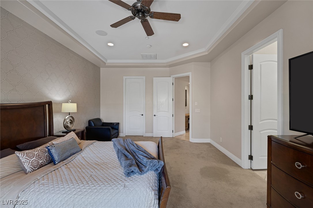 1545 Villa Rica Drive Henderson, NV 89052 - Photo 36 of 61 Bedroom featuring an accent wall, light colored carpet, wallpapered walls, ceiling fan, and recessed lighting