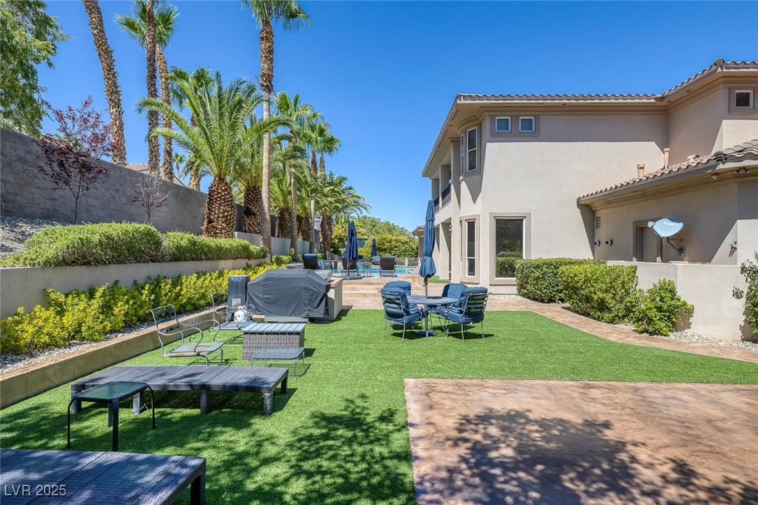 1545 Villa Rica Drive Henderson, NV 89052 - Photo 45 of 61 Surrounding community with a patio and a pool