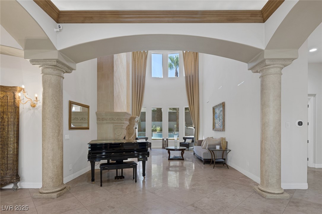 1545 Villa Rica Drive Henderson, NV 89052 - Photo 7 of 61 Community lobby featuring crown molding and a high ceiling