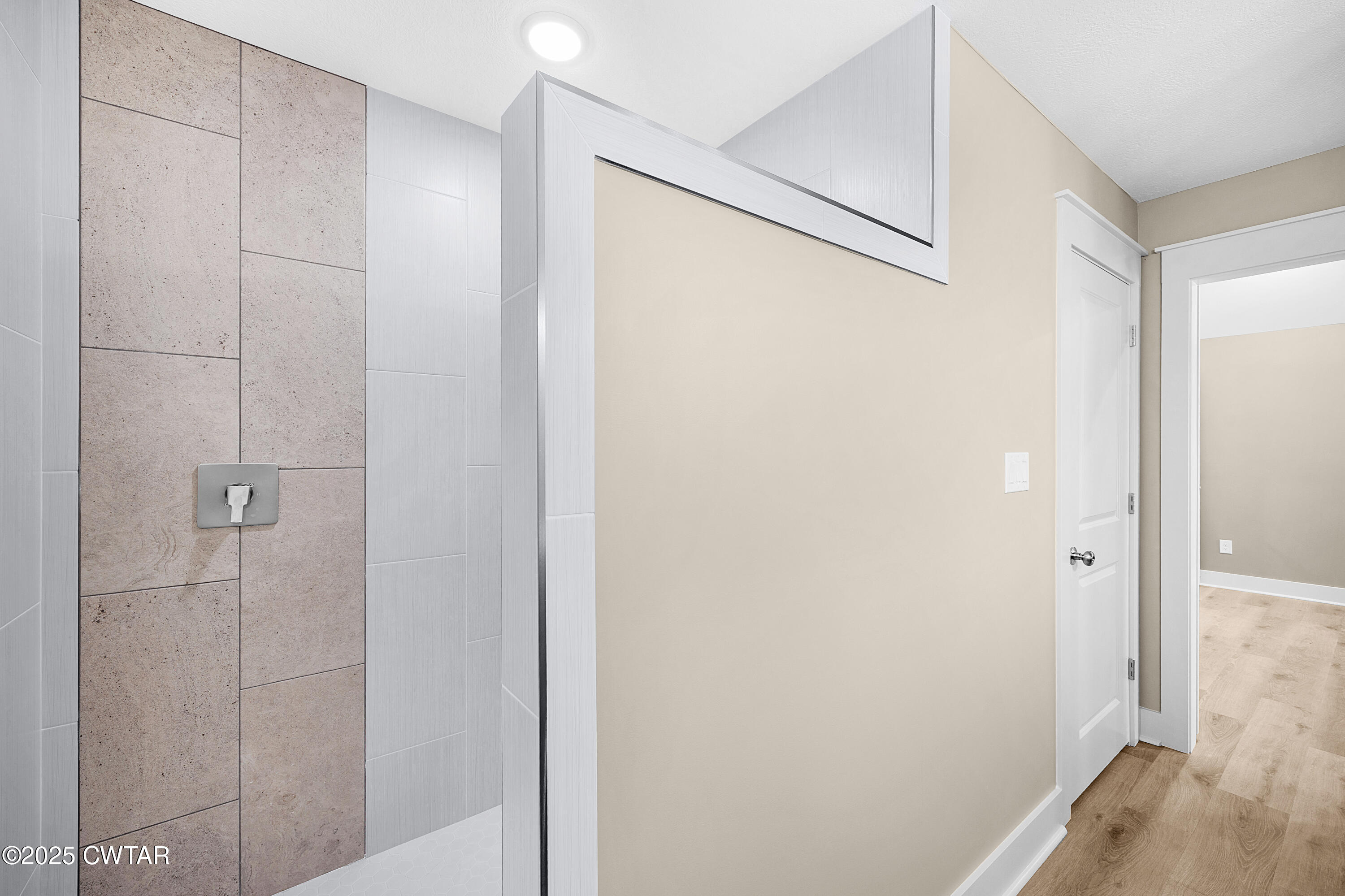 36 Grande Pnes Cove Jackson, TN 38305 - Photo 16 of 23 a bathroom with a shower and a glass door