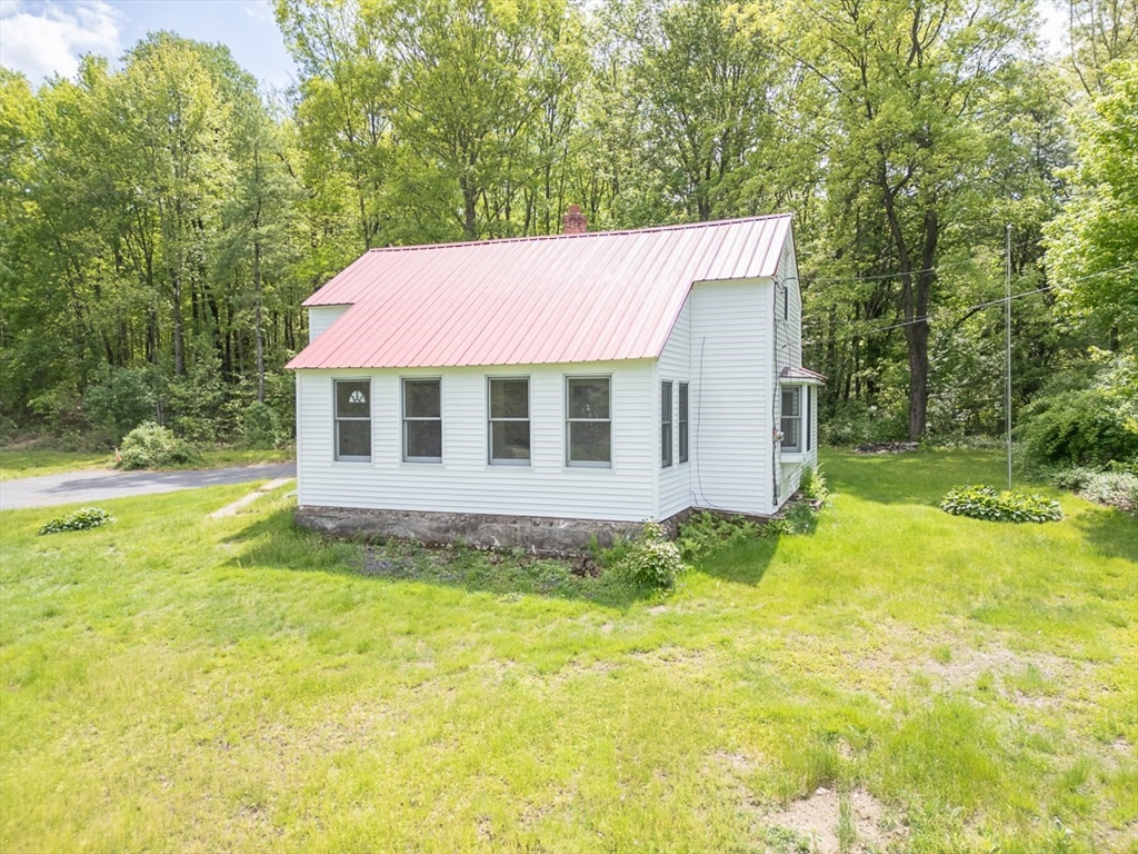 92 Squannacook Road Shirley, MA 01464 - Photo 34 of 38 a view of a house with a yard