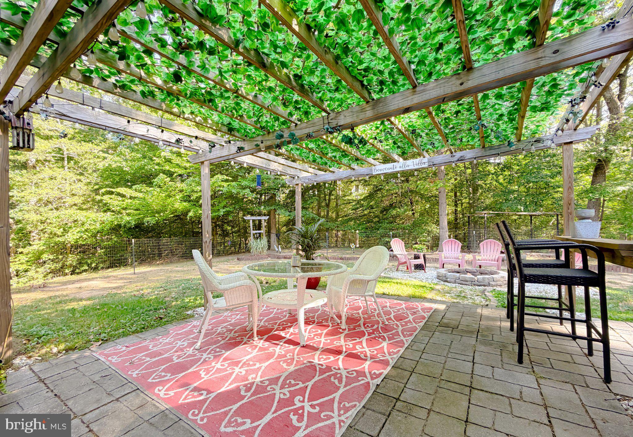 6020 Port Tobacco Road Indian Head, MD 20640 - Photo 6 of 59 Serene outdoor retreat with lush canopy.