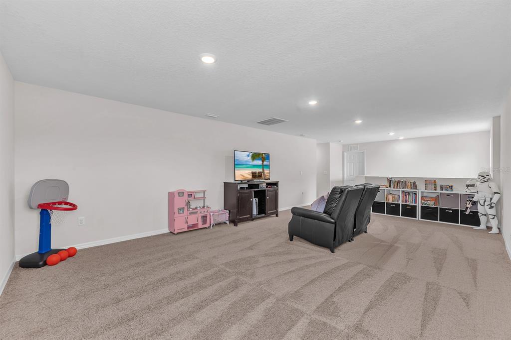 12952 Wellspring Drive Lithia, FL 33547 - Photo 23 of 46 a living room with furniture