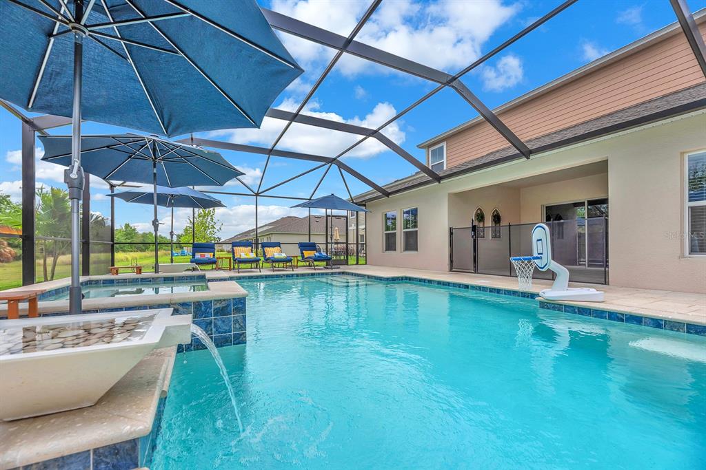 12952 Wellspring Drive Lithia, FL 33547 - Photo 37 of 46 a swimming pool with outdoor seating yard and patio