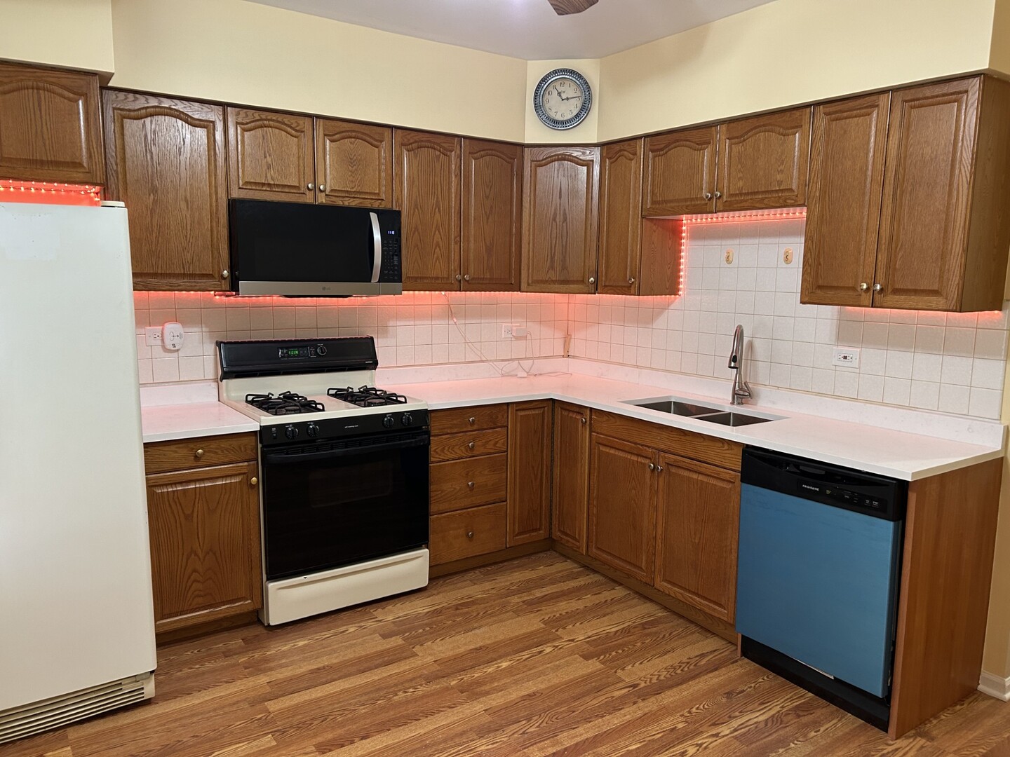 5107 West Cullom Avenue, Unit 2 Chicago, IL 60641 - Photo 16 of 22 a kitchen with a sink cabinets and stainless steel appliances