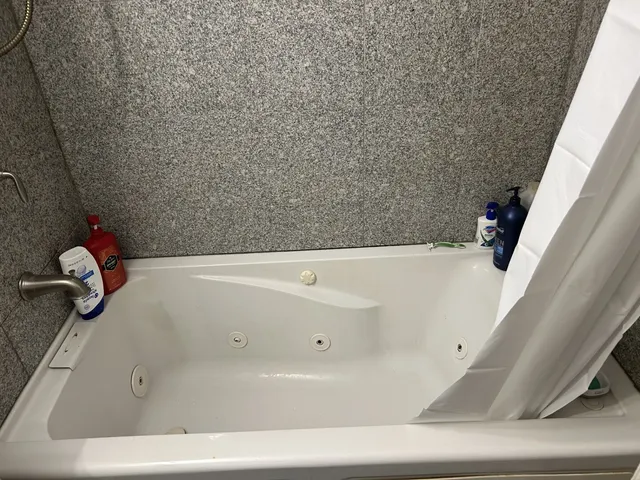 a bathroom with a tub