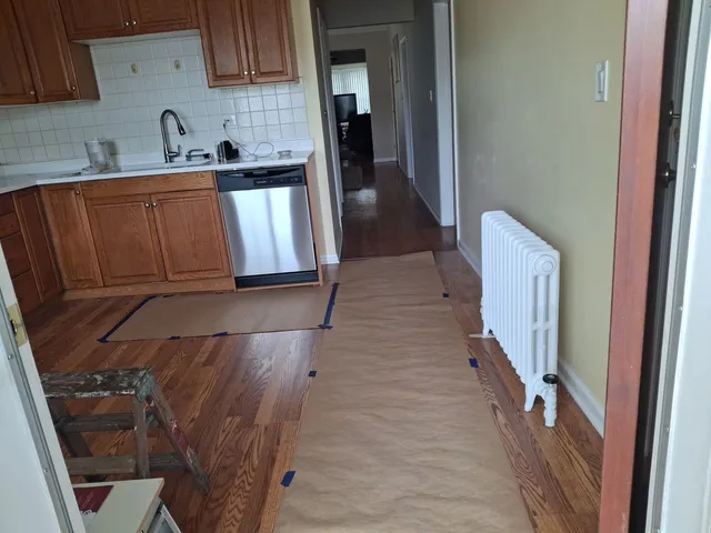 a hallway with cabinets