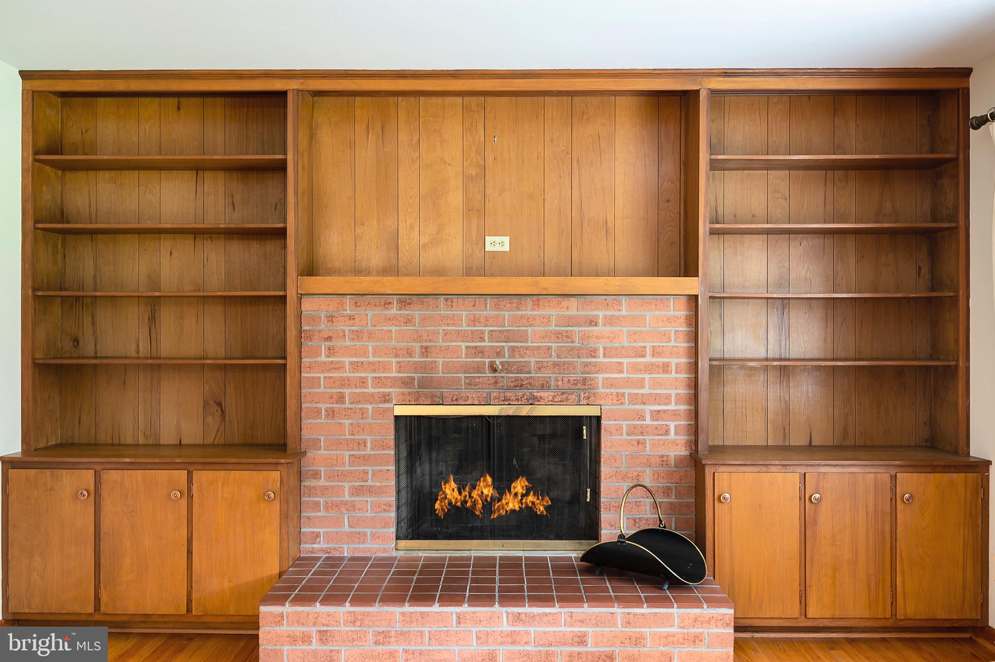 2801 Raleigh Road Walkersville, MD 21793 - Photo 8 of 32 Built In Bookcases and fireplace in living room