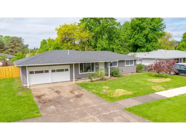 a house view with a garden space