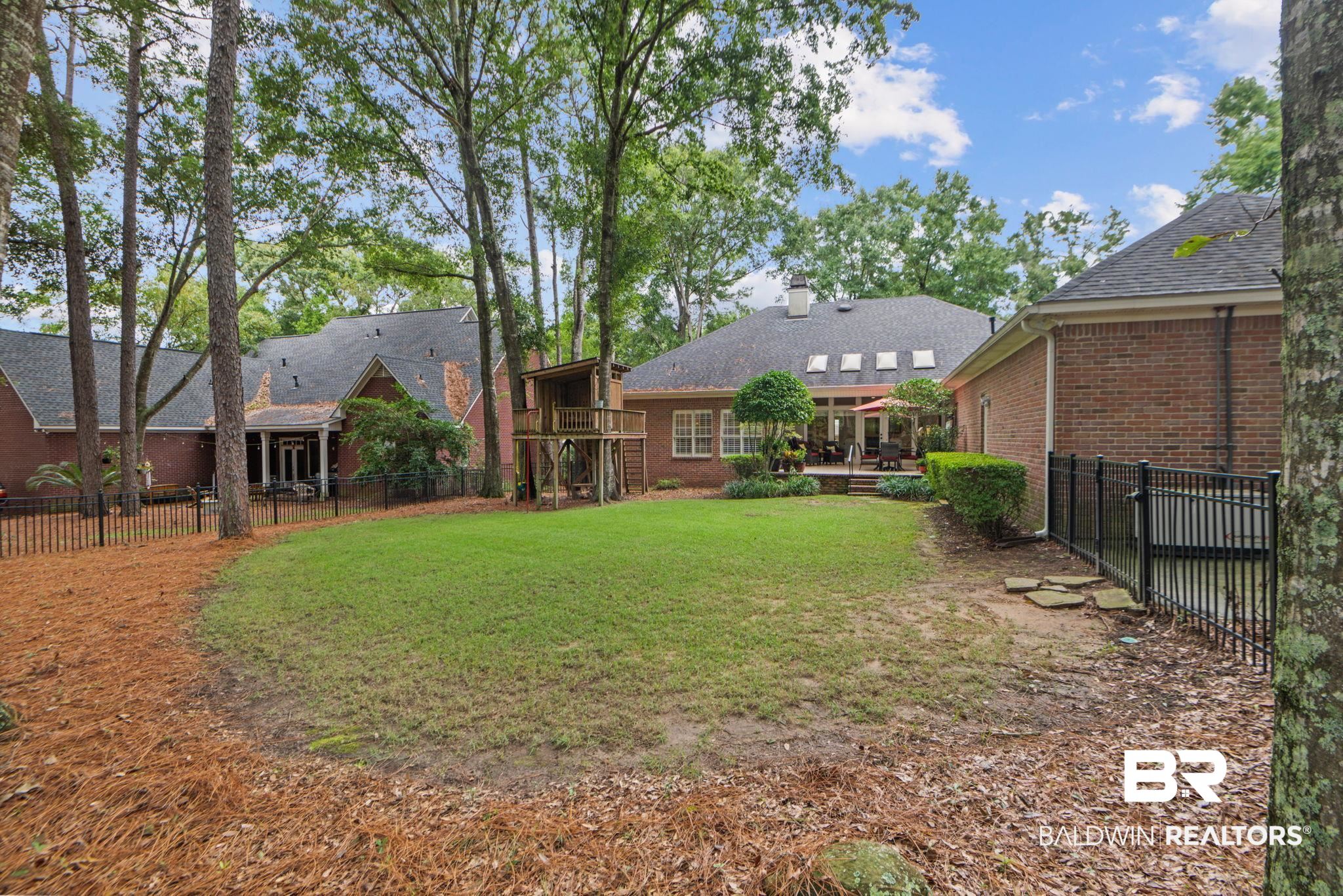 105 Beaver Dam Road Fairhope, AL 36532 - Photo 41 of 55 View of yard with a wooden deck