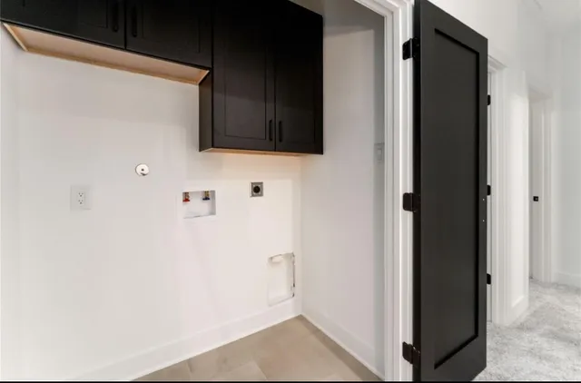a view of a kitchen from the hallway