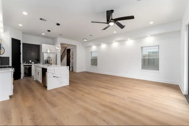 a view of a kitchen with a sink