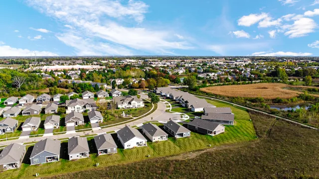 a view of a fountain in the middle of a garden