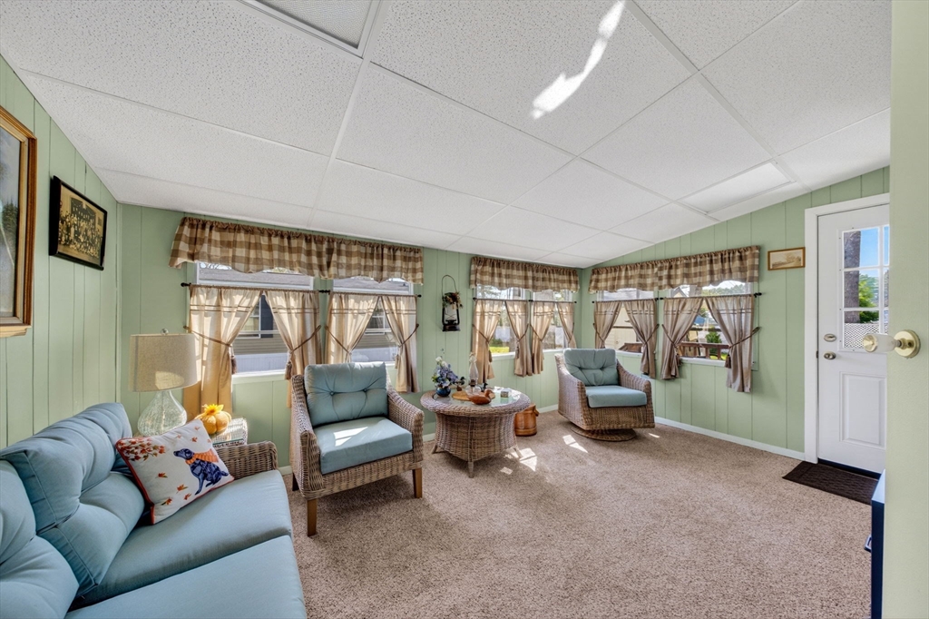 19 Timber Lane Wareham, MA 02571 - Photo 24 of 38 a living room with furniture and a large window