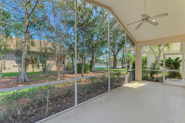 a view of a room with balcony and furniture
