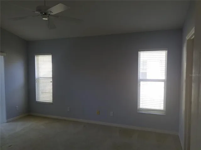 an empty room that has a window